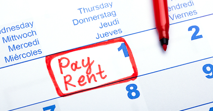Calendar with Pay Rent circled in red marker