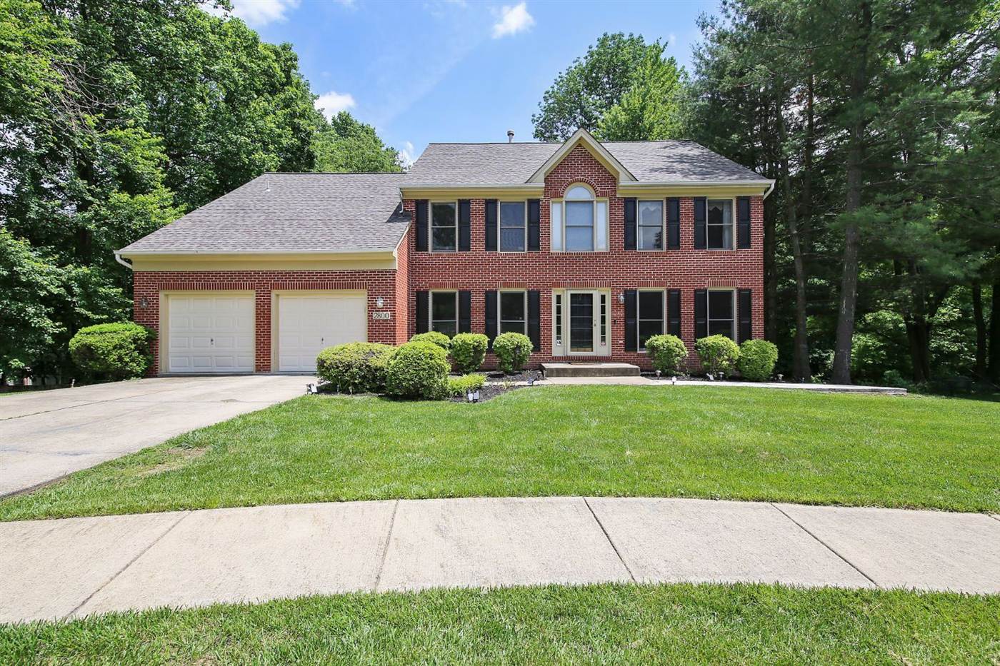 Brick colonial home with a two-car garage