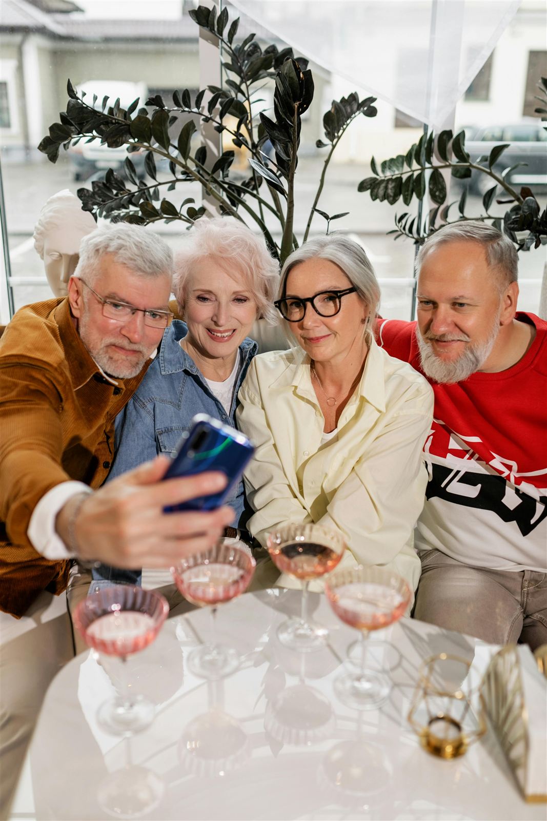 Active seniors taking a selfie together